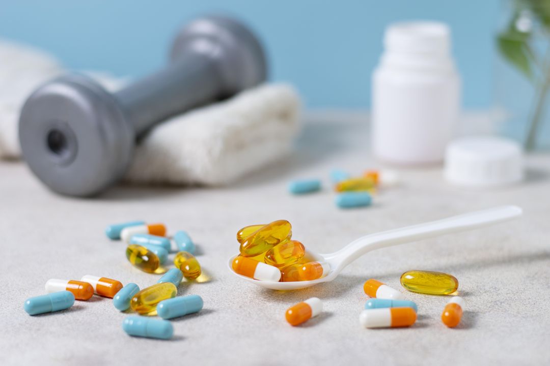 Suplementos e halteres para saúde e fitness